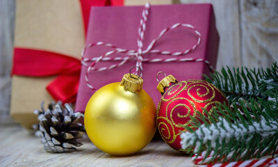 Christmas decorations toys gifts on a wooden background.