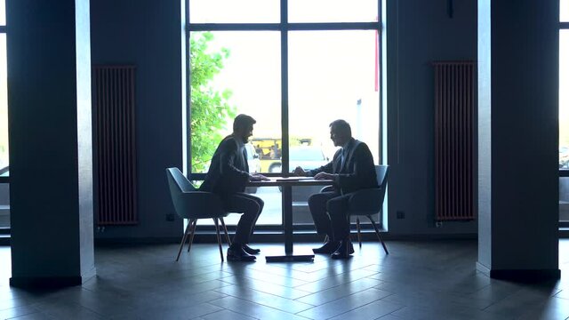 business people handshake, corporate executives shaking hands partnership deal welcoming opportunity for cooperation