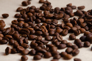 aromatic coffee grains close-up on a light background