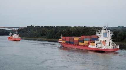 Red container ship on the way to Finland