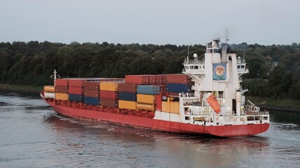 Fototapeta premium Red container ship on the way to Helsinki