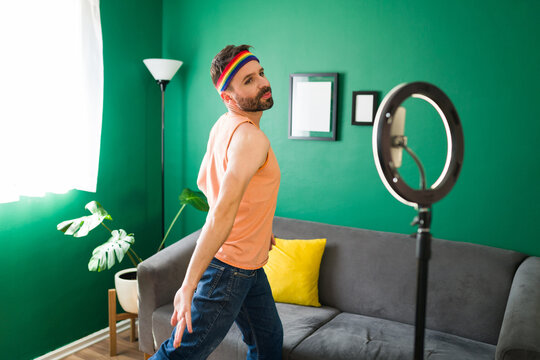 Attractive gay man doing a choreography - Powered by Adobe