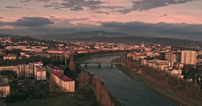 Colorful cinematicsunset over Uzhgorod city and Uzh river, Transcarpathia, Ukraine Europe. 4k