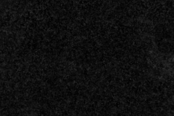 Dark background from the texture of polished granite stone