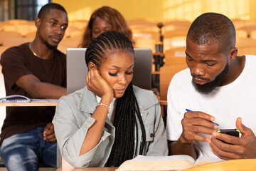 group of african students studying in a classroom