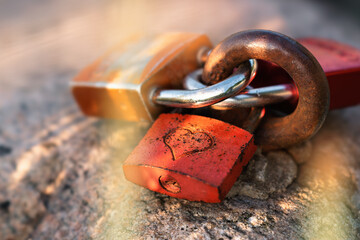 Three love locks with an engraved heart