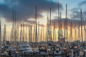 Boat jetty with yachts on a pier in the morning