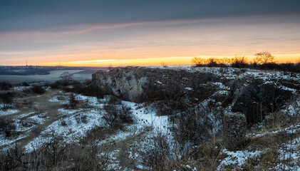Sunrise over the snowy hills