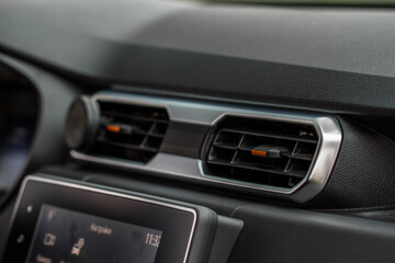 Car air conditioning system. Car air condition. Modern car interior detail.