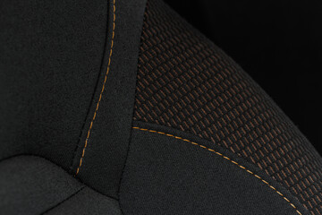 High angle view of modern car fabric seats. Close-up car seat texture and interior details....