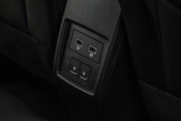 USB port in the car panel close up. Car interior detail. Car usb charger detail.