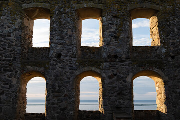 Windows in the wall of an old ruin (castle) in Sweden.