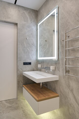 Modern luxury stylish apartment interior in pastel colors. a very bright room with huge windows filled with daylight. blue walls, wooden parquet floors