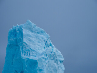 photos of mountains, glaciers, icebergs, and sea ice in the Canadian Arctic landscape. 