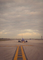 Fototapeta na wymiar airplane landing on the airport