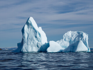 photo of mountain, glacier, sea ice, ocean and icebergs in the canadian arctic