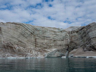 photo of mountain, glacier, sea ice, ocean and icebergs in the canadian arctic © Patrick