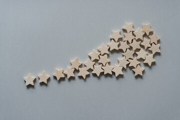 wooden stars on gray paper