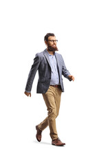 Full length shot of a bearded man with glasses walking