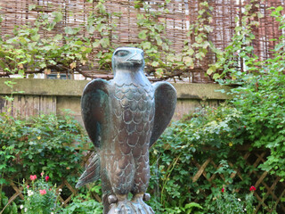 Figure of a bird as decorative top of a water fountain in Queen Eleanor's medieval garden by The...