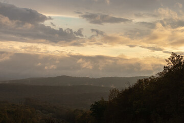 panoramic view of mountains and hills in the fog
