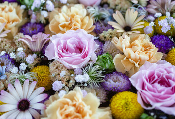 Background made of colorful flowers of rose, mum and carnation.