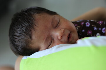 rosto bebê dormindo