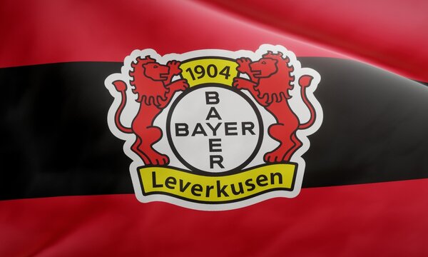 Logo of German football club Bayer 04 Leverkusen on waving fabric. Editorial 3D rendering