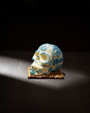 ornamented mexican skull made of white chocolate, traditional gift for "dia de muertos" day of the death in Mexico culture named "calaverita de azucar" or "calaverita de chocolate"