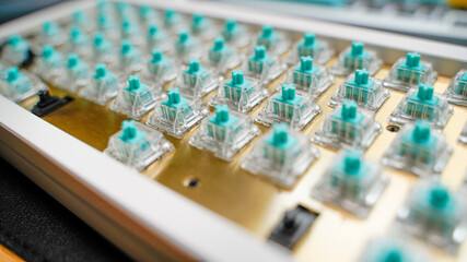 A premium 65% layout custom Aluminium mechanical keyboard with brass plate and tactile switches