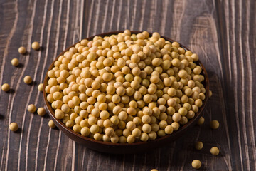 Soybean seeds grain on wooden background