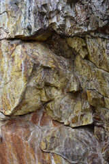 Interior rock wall of a cave that was blasted for mining in an abandoned gold mine near Bishop, CA in the Eastern Sierra