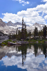 Majestic Eastern Sierra mountains and sky reflecting on Blue Lake near Bishop, CA