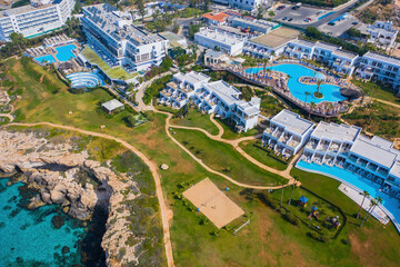 Ayia Napa resort in Cyprus. Ayia Napa city from a bird's eye view. Resort hotels on shores of Mediterranean Sea. Hotels on coast of Cyprus. Travel to island of Cyprus. Ayia Napa panorama.
