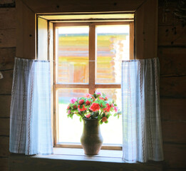 An old wooden window  in retro style. A typical old style country scene