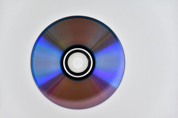 Used laser CD or DVD on the surface of the white background - 461812946