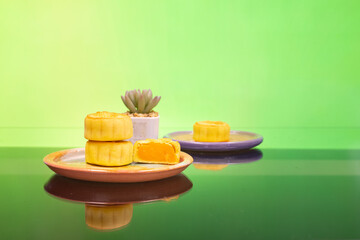 Moon cake with pretty background, a traditional food, cuisine, or snack for Chinese or Asian  Mid-Autumn festival 
