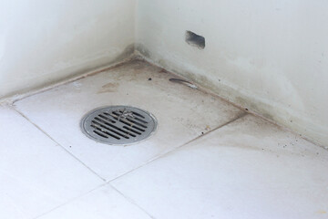 Dirty concrete balcony with no access to a hose. Concept of tips and suggestion for the cleaning...