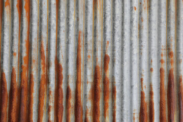 Metallic metal steel tin fence wall sheet  damaged by red brown rust zinc. Concept of wallpaper ...
