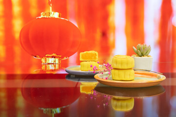 Moon cake with pretty background, a traditional food, cuisine, or snack for Chinese or Asian  Mid-Autumn festival 