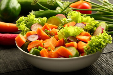 Homemade delicious and healthy fresh green salad bowl.