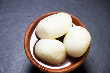 Image of Rasgulla or Rosogolla or Rosgola or Rasagola is a South Asian syrupy dessert popular in the Indian subcontinent
