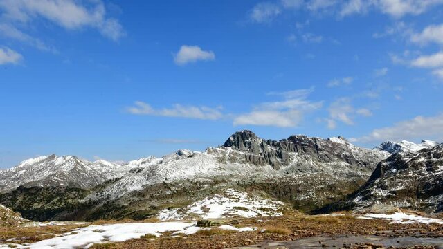 Time-Lapse on the peaks with snowfall in early autumn. The zone is that one of the orobie prealps brembana valley. in Lombardy Italy