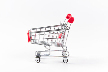 A Empty grocery shopping cart. Isolated on white background