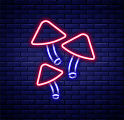 Glowing neon line Mushroom icon isolated on brick wall background. Colorful outline concept. Vector