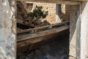 Fototapeta na wymiar Heraklion, Crete, Greece, September 28 2021: A day after the catastrophic earthquake 5,8 magnitude at the town of Arkalochori. Damaged buildings, pavements full of wall fragments and debris.