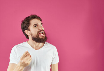 bearded man in a white t-shirt surprised look Lifestyle