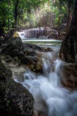 Naklejka premium Erawan Waterfall at Kanchanaburi in Thailand during rainy season. Taken picture at the 5th floor of waterfall, it is called 