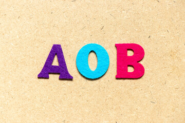Color cloth alphabet letter in word AOB (abbreviation of Assignment of benefits or Any other...