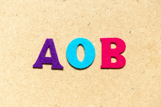 Color cloth alphabet letter in word AOB (abbreviation of Assignment of benefits or Any other business) on wood background